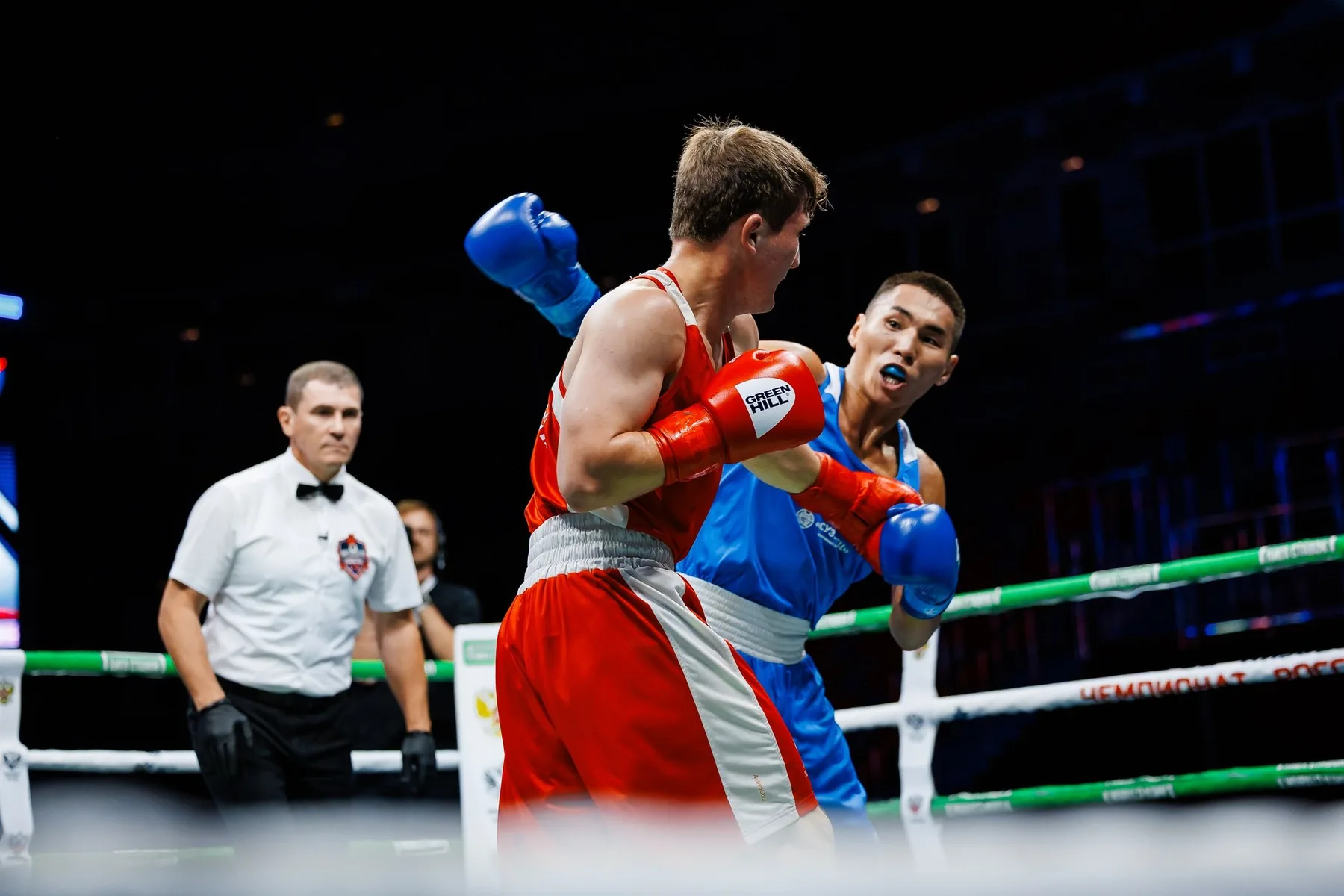 Boxers competing in the ring
